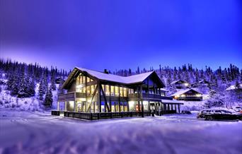 Den Lykkelige sportsmann ligger vakkert til ved foten av Gaustatoppen