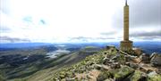 Fra toppen av Gaustatoppen kan du på en klarværsdag se 1/6 av Norge.