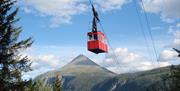 Krossobanen frakter deg opp til Rjukan klatrepark